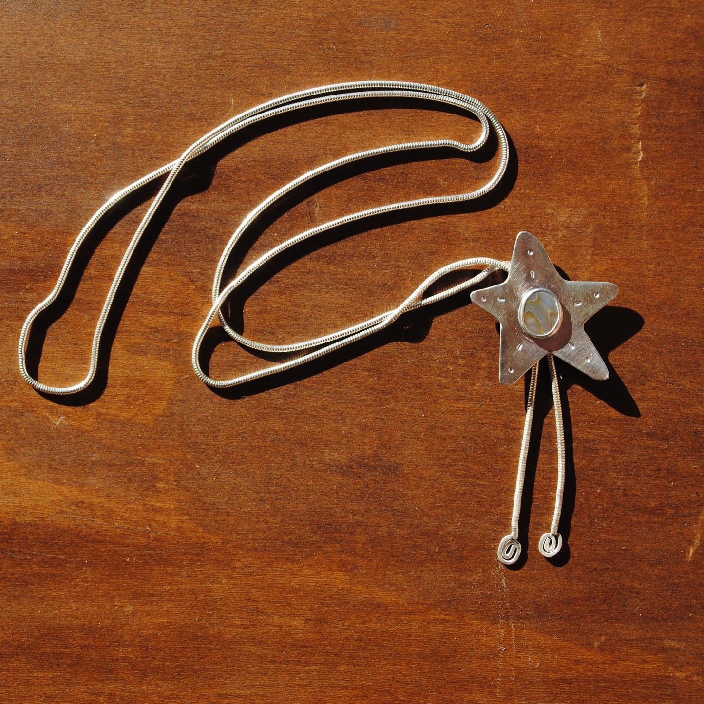 Abalone Star Bolo Tie