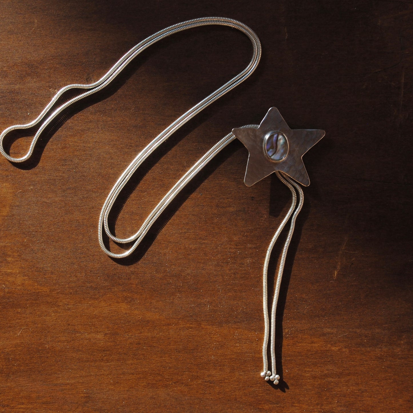 Abalone Hammered Star Bolo Tie
