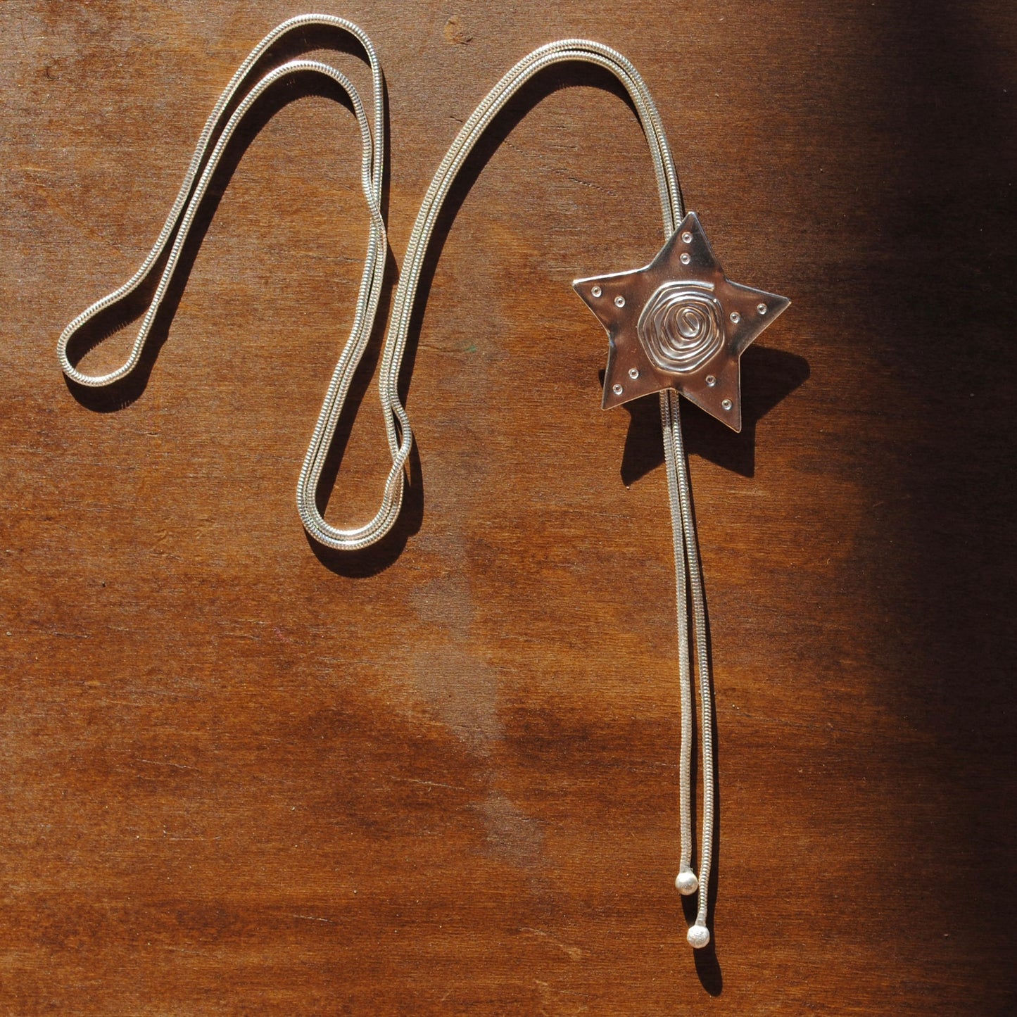 Spiral Star Bolo Tie