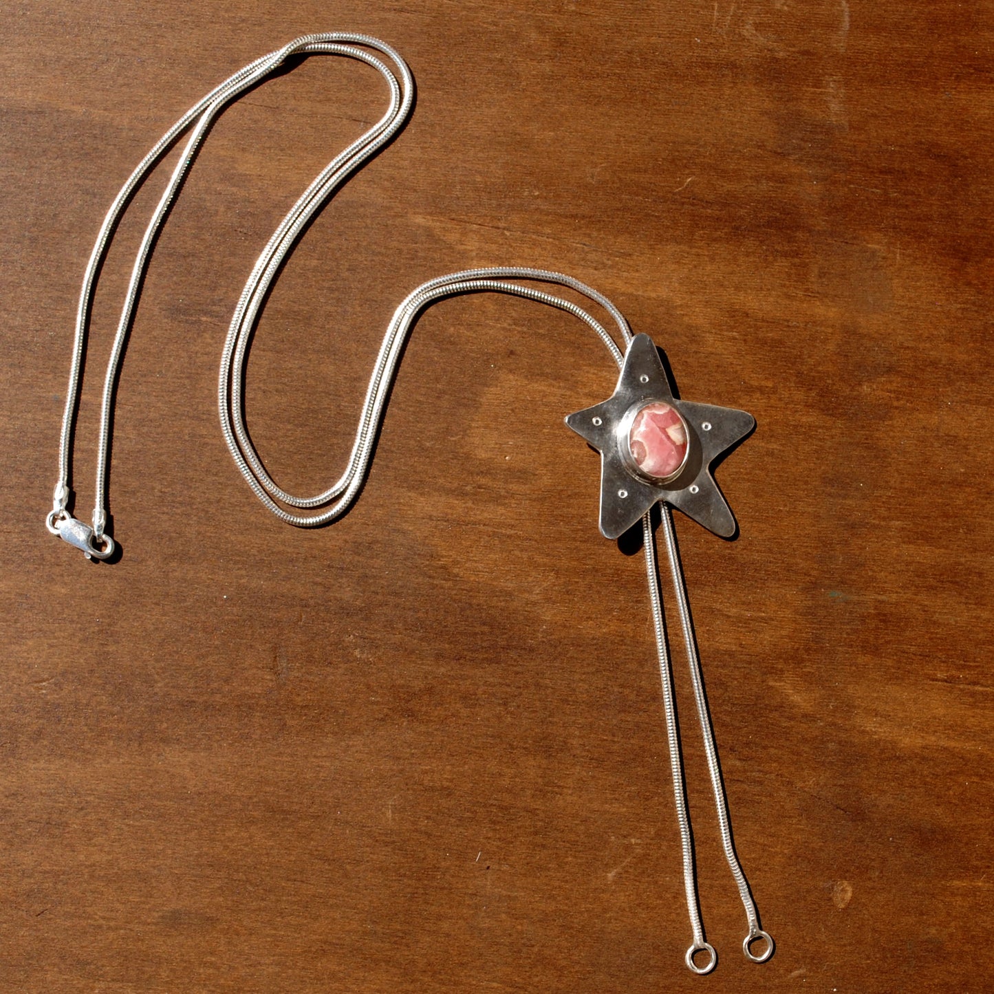 Rhodochrosite Star Bolo Tie