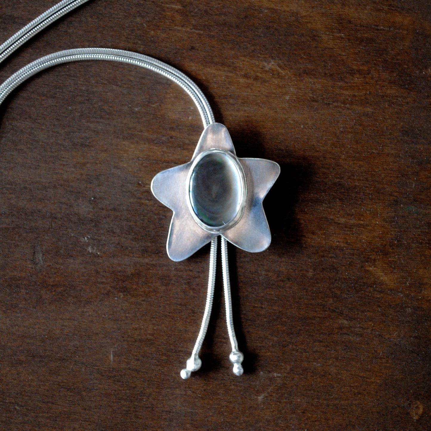 Black Mother of Pearl Star Bolo Tie