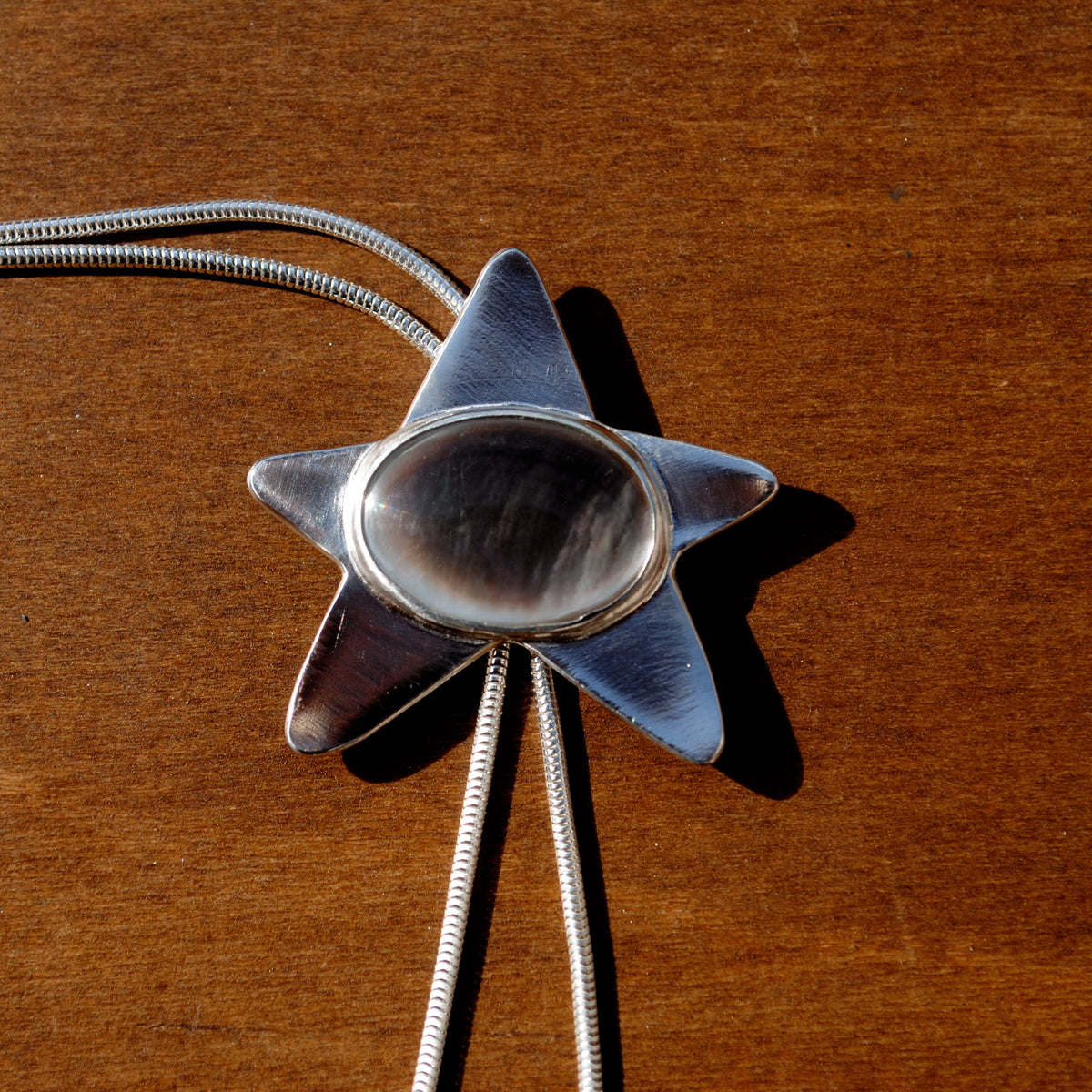 Black Mother of Pearl Star Bolo Tie