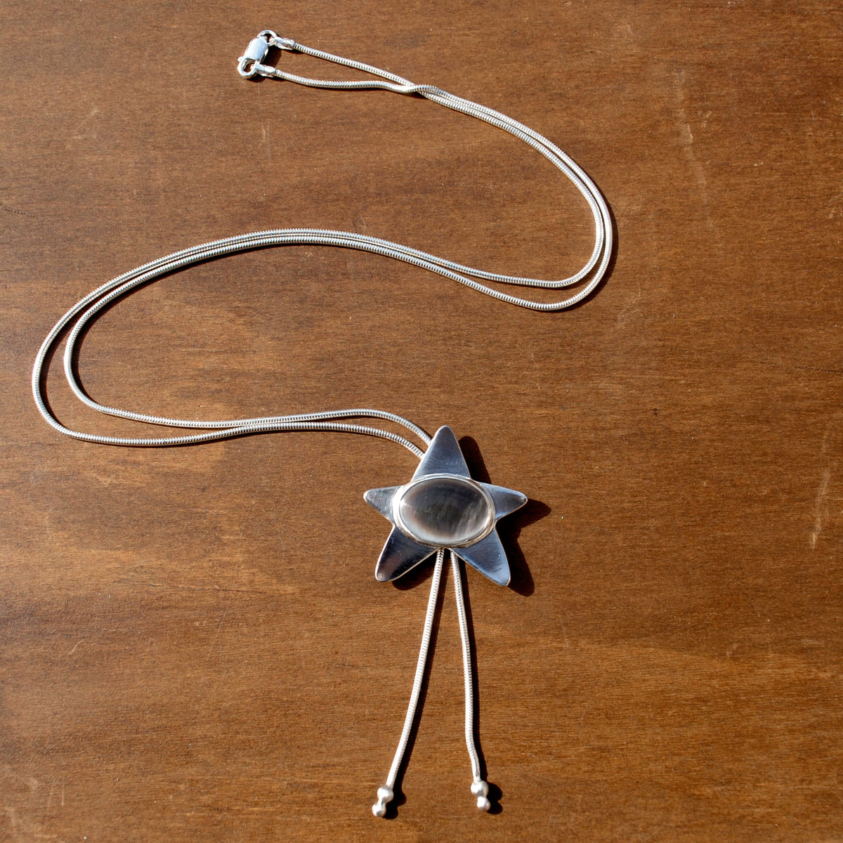 Black Mother of Pearl Star Bolo Tie