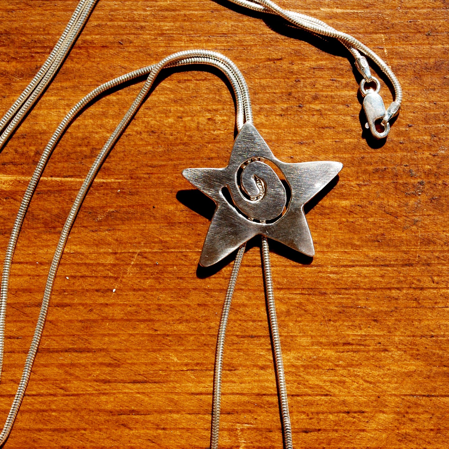 Spiral Star Bolo Tie