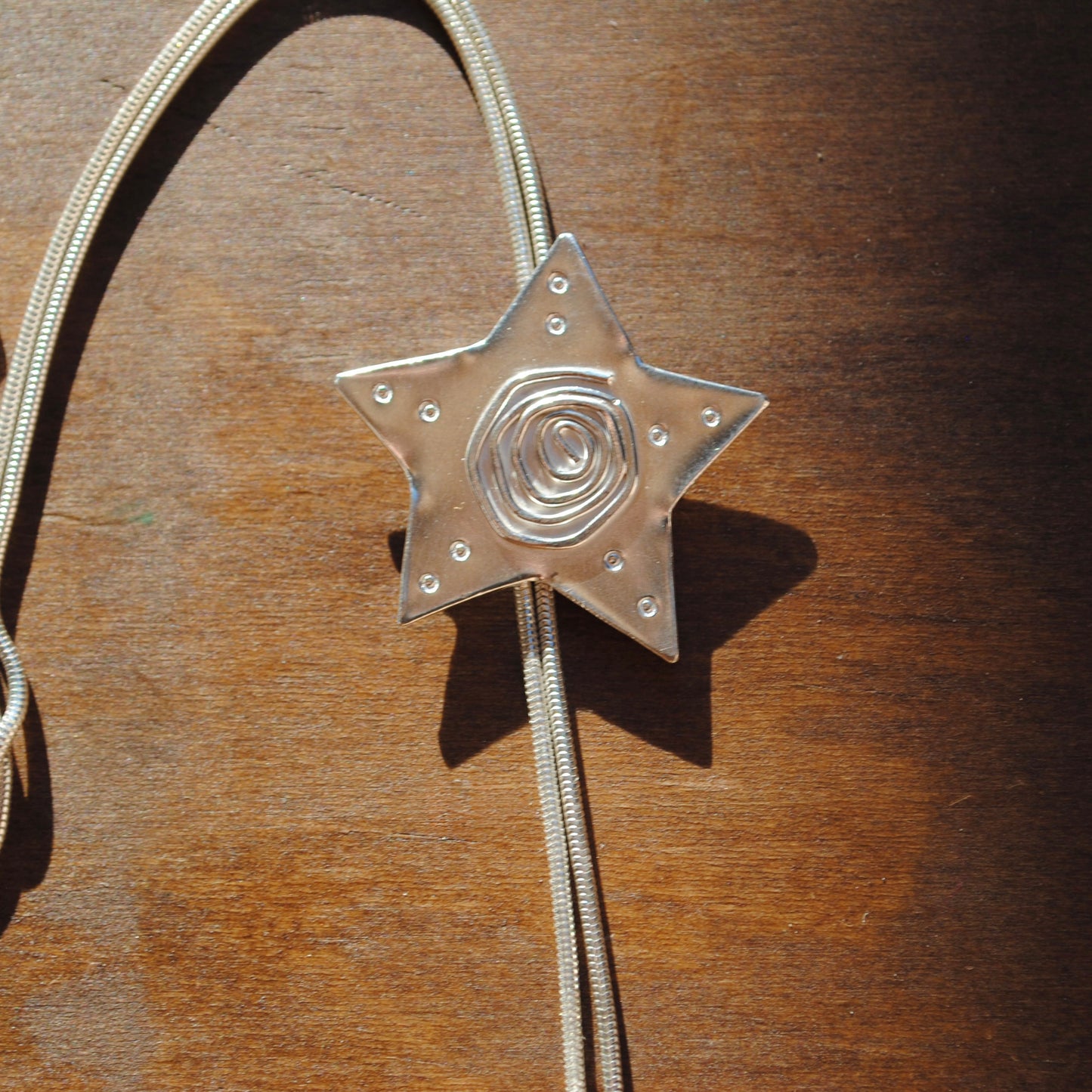 Spiral Star Bolo Tie