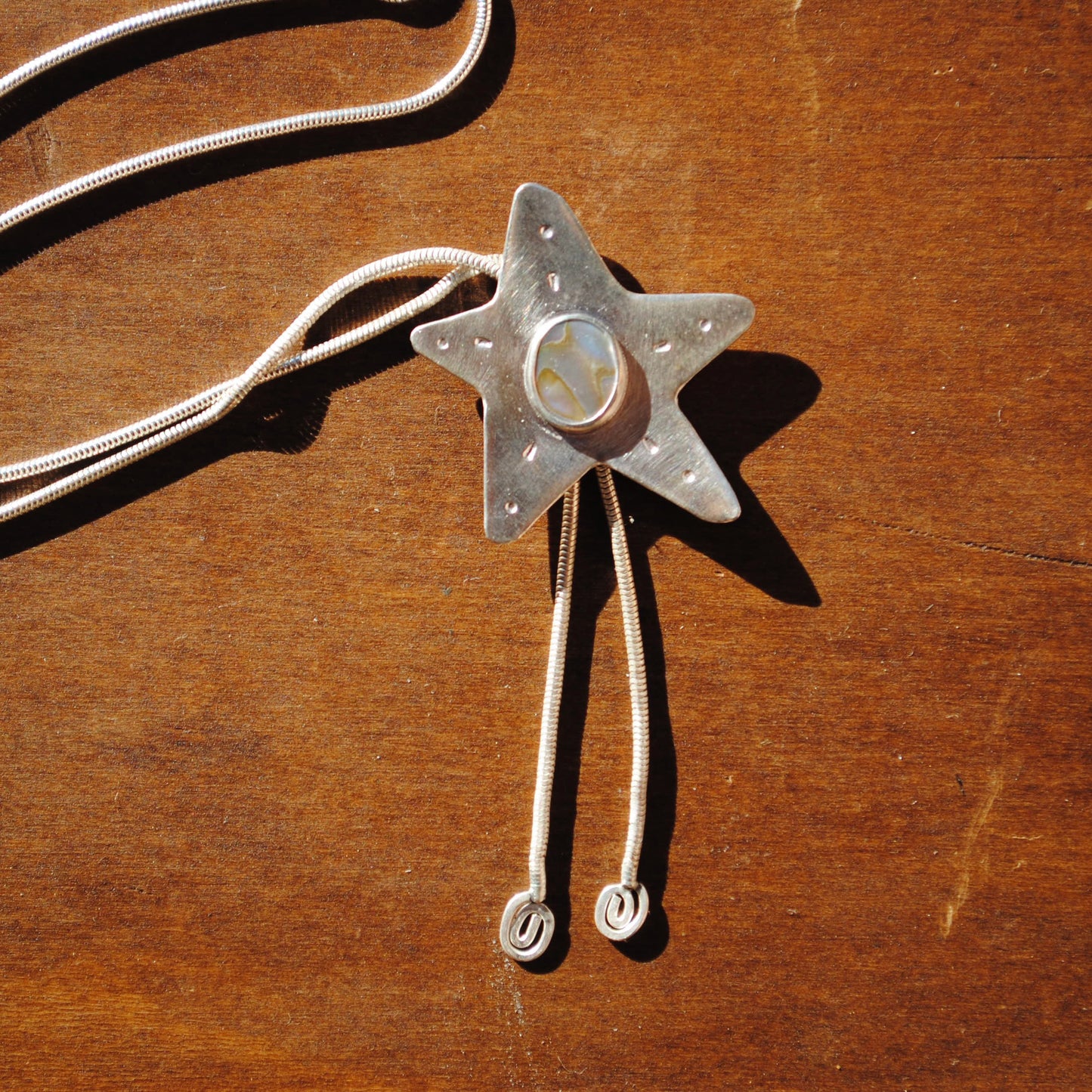 Abalone Star Bolo Tie